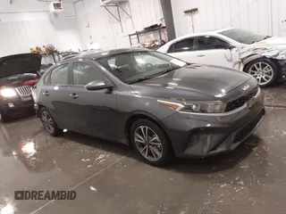 2023 Kia Forte LXS z VIN 3KPF24AD1PE558342, wystawiony jako IAAI lot #41959350 z przebiegiem 32 353 mil mil oraz . Historia ofert i sprzedaży dostępna na DreamBid. Obrazek 1.