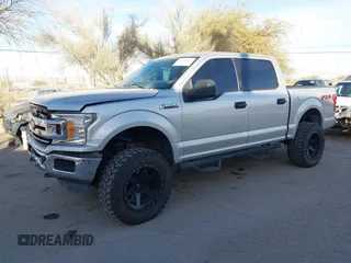 2019 Ford F-150 XL with VIN 1FTEW1E43KKE23264, listed as a IAAI auction lot 41395865 with 106,898 mi miles. Bid and sale history available at carsss.com. Image 2.