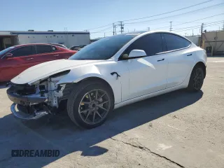 2022 Tesla Model 3 with VIN 5YJ3E1EA3NF125895, listed as a Copart auction lot 50042005 with 47,181 mi miles and Salvage Title. Bid and sale history available at DreamBid. Image 1.