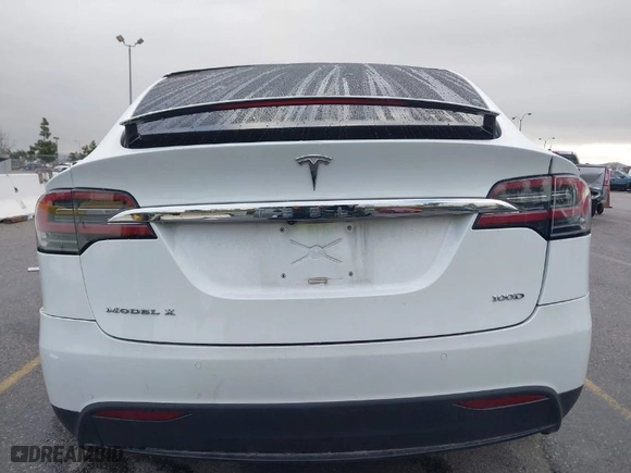 2018 Tesla Model X 75D with VIN 5YJXCBE2XJF102341, listed as a IAAI auction lot 41731511 with NaN miles. Bid and sale history available at carsss.com. Image 16.