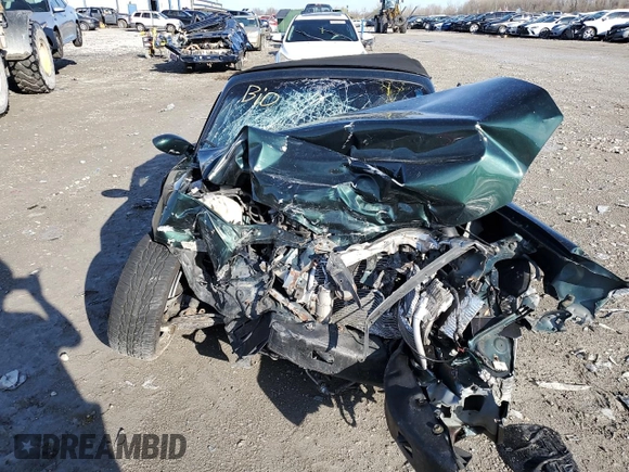 1999 Mazda MX-5 Miata z VIN JM1NB3536X0133733, wystawiony jako Copart lot #50906215 z przebiegiem Nie podano mil oraz Szkoda całkowita • Salvage title. Historia ofert i sprzedaży dostępna na DreamBid. Obrazek 5.