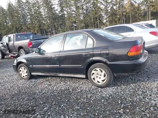 1997 Honda Civic EX with VIN 2HGEJ8542VH520783, listed as a IAAI auction lot 40744085 with 155,772 mi miles. Bid and sale history available at carsss.com. Image 14.