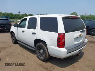 2014 Chevrolet Tahoe Commercial с VIN 1GNLC2E07ER228838, выставлен на аукционе IAAI как лот 42410417 с пробегом 140 342 миль миль и . История ставок и продаж доступна на DreamBid. Изображение 3.
