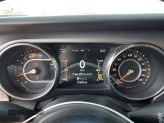 2023 Jeep Wrangler Willys z VIN 1C4HJXAG4PW512615, wystawiony jako Copart lot #56068085 z przebiegiem 21 624 mil mil oraz Szkoda całkowita • Salvage title. Historia ofert i sprzedaży dostępna na DreamBid. Obrazek 9.
