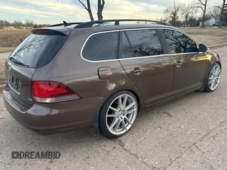 2014 Volkswagen Jetta SportWagen TDI w/Sunroof with VIN 3VWPL7AJ0EM615977, listed as a Copart auction lot 43859805 with 94,671 mi miles and Clean Title. Bid and sale history available at carsss.com. Image 4.