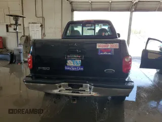 2003 Ford F-150 with VIN 2FTRF08L03CA03160, listed as a Copart auction lot 51591535 with 220,630 mi miles and Salvage title. Bid and sale history available at DreamBid. Image 6.