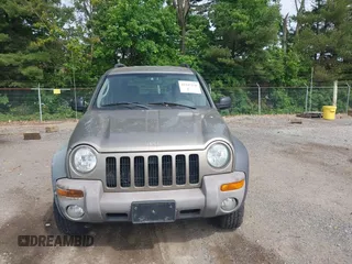 2004 Jeep Liberty Sport z VIN 1J4GL48K24W254129, wystawiony jako IAAI lot #42347170 z przebiegiem 193 513 mil mil oraz . Historia ofert i sprzedaży dostępna na DreamBid. Obrazek 12.