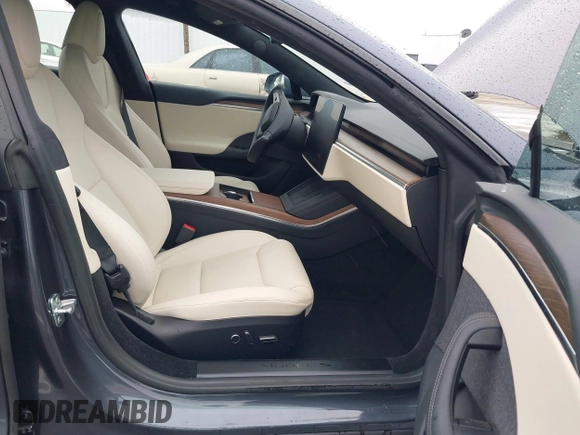 2022 Tesla Model S with VIN 5YJSA1E52NF459460, listed as a IAAI auction lot 41736236 with Not Provided miles and . Bid and sale history available at DreamBid. Image 5.