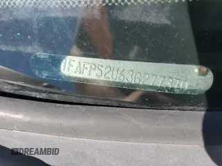 2003 Ford Taurus LX Standard z VIN 1FAFP52U63G277370, wystawiony jako Copart lot #56184345 z przebiegiem 115 778 mil mil oraz Szkoda całkowita • Salvage title. Historia ofert i sprzedaży dostępna na DreamBid. Obrazek 12.