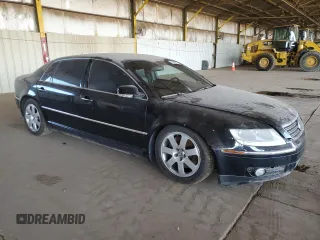 2004 Volkswagen Phaeton V8 z VIN WVWAF63D548010888, wystawiony jako Copart lot #77903574 z przebiegiem 68 511 mil mil oraz Szkody całkowita. Historia ofert i sprzedaży dostępna na DreamBid. Obrazek 4.