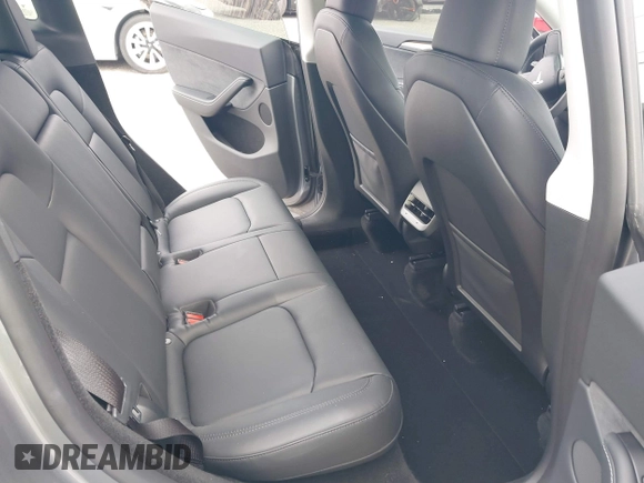 2024 Tesla Model Y Performance with VIN 7SAYGDEF3RA307468, listed as a IAAI auction lot 41805853 with 10,377 mi miles and . Bid and sale history available at DreamBid. Image 8.