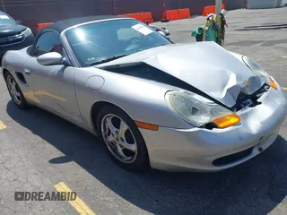 2000 Porsche Boxster with VIN WP0CA2986YU625005, listed as a IAAI auction lot 42643093 with 90,595 mi miles and . Bid and sale history available at DreamBid. Image 1.