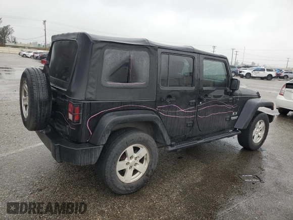 2009 Jeep Wrangler Unlimited X with VIN 1J4GA39119L755818, listed as a Copart auction lot 47886245 with 187,972 mi miles and Salvage Title. Bid and sale history available at carsss.com. Image 3.