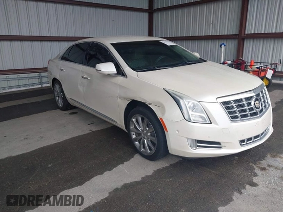 2014 Cadillac XTS Luxury with VIN 2G61M5S31E9210460, listed as a IAAI auction lot 41602087 with 1 mi miles. Bid and sale history available at carsss.com. Image 1.