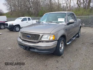 2003 Ford F-150 XLT with VIN 1FTRW07673KD34518, listed as a IAAI auction lot 41975405 with 95,775 mi miles. Bid and sale history available at carsss.com. Image 2.