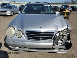 2001 Mercedes-Benz E-Class AWD with VIN WDBJH82J11X056425, listed as a Copart auction lot 48612975 with 130,900 mi miles and Salvage Title. Bid and sale history available at carsss.com. Image 5.
