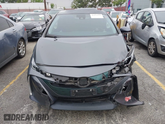 2018 Toyota Prius Plus with VIN JTDKARFP5J3095377, listed as a IAAI auction lot 42153552 with 77,255 mi miles and . Bid and sale history available at DreamBid. Image 6.