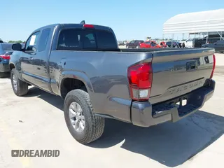 2020 Toyota Tacoma SR with VIN 3TYRX5GNXLT002488, listed as a IAAI auction lot 41973584 with 76,169 mi miles and . Bid and sale history available at DreamBid. Image 3.