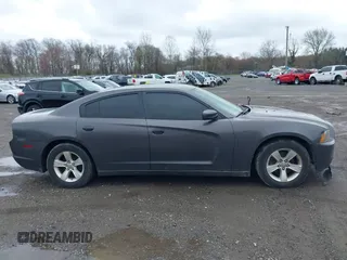2014 Dodge Charger SE with VIN 2C3CDXBG8EH117241, listed as a IAAI auction lot 41952443 with 158,432 mi miles and . Bid and sale history available at DreamBid. Image 13.