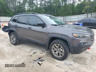 2022 Jeep Cherokee Trailhawk с VIN 1C4PJMBX1ND529146, выставлен на аукционе Copart как лот 56237365 с пробегом 26 718 миль миль и Списание • Salvage title. История ставок и продаж доступна на DreamBid. Изображение 4.