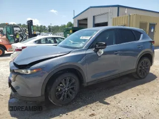 2024 Mazda CX-5 S Carbon Edition z VIN JM3KFBCL7R0530172, wystawiony jako Copart lot #57868335 z przebiegiem 15 441 mil mil oraz Czysty tytuł • Clean title. Historia ofert i sprzedaży dostępna na DreamBid. Obrazek 1.