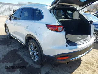 2018 Mazda CX-9 Grand Touring with VIN JM3TCADY6J0229768, listed as a IAAI auction lot 41724072 with 80,918 mi miles and . Bid and sale history available at DreamBid. Image 3.