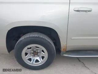 2015 Chevrolet Suburban LTZ with VIN 1GNSKKKC0FR525772, listed as a IAAI auction lot 41745084 with 187,981 mi miles. Bid and sale history available at carsss.com. Image 6.