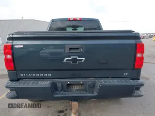 2017 Chevrolet Silverado 1500 LT with VIN 3GCUKREC7HG220780, listed as a IAAI auction lot 41978463 with 131,532 mi miles and . Bid and sale history available at DreamBid. Image 16.