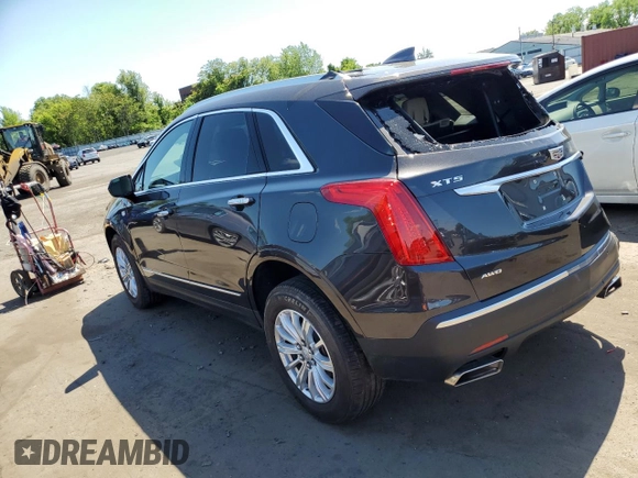 2018 Cadillac XT5 AWD with VIN 1GYKNBRS8JZ203963, listed as a Copart auction lot 57243165 with 18,407 mi miles and Salvage title. Bid and sale history available at DreamBid. Image 2.