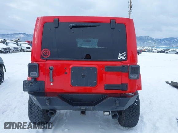 2015 Jeep Wrangler Unlimited Rubicon with VIN 1C4BJWFG7FL646463, listed as a IAAI auction lot 41537553 with 97,412 mi miles. Bid and sale history available at carsss.com. Image 16.