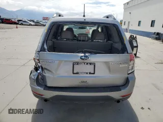 2010 Subaru Forester X Premium с VIN JF2SH6CC2AH761627, выставлен на аукционе Copart как лот 54552485 с пробегом 86 400 миль миль и Списание • Salvage title. История ставок и продаж доступна на DreamBid. Изображение 6.