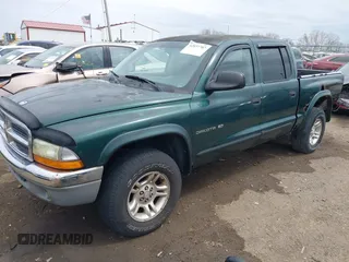 2001 Dodge Dakota Sport z VIN 1B7HG2ANX1S256902, wystawiony jako IAAI lot #42037703 z przebiegiem 121 914 mil mil oraz . Historia ofert i sprzedaży dostępna na DreamBid. Obrazek 17.