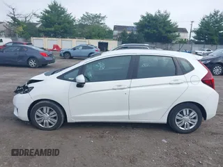 2015 Honda Fit LX with VIN 3HGGK5H51FM752870, listed as a IAAI auction lot 42378020 with 109,698 mi miles and . Bid and sale history available at DreamBid. Image 14.