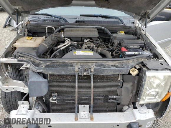 2010 Jeep Commander Sport with VIN 1J4RG4GK2AC121821, listed as a Copart auction lot 57793545 with 171,405 mi miles and Salvage title. Bid and sale history available at DreamBid. Image 12.