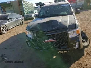 2021 GMC Canyon 4WD AT4 w/Cloth with VIN 1GTG6FEN9M1254293, listed as a Copart auction lot 87163874 with 33,645 mi miles and Salvage Title. Bid and sale history available at carsss.com. Image 11.