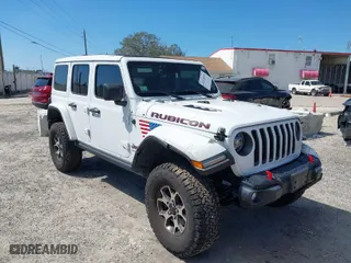 2021 Jeep Wrangler Unlimited Rubicon with VIN 1C4HJXFN9MW519496, listed as a IAAI auction lot 41676845 with 72,767 mi miles. Bid and sale history available at carsss.com. Image 1.