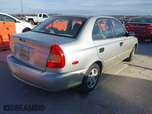 2000 Hyundai Accent z VIN KMHCG45G3YU034438, wystawiony jako IAAI lot #41356583 z przebiegiem 57 283 mil mil oraz . Historia ofert i sprzedaży dostępna na DreamBid. Obrazek 4.