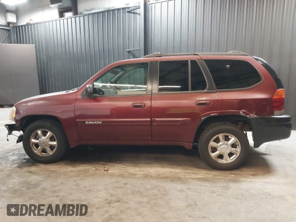 2002 GMC Envoy SLT with VIN 1GKDT13SX22426320, listed as a IAAI auction lot 41709359 with 104,418 mi miles. Bid and sale history available at carsss.com. Image 14.