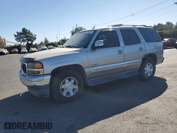 2005 GMC Yukon SLE with VIN 1GKEC13T95J150381, listed as a Copart auction lot 77405144 with 176,516 mi miles and Clean Title. Bid and sale history available at carsss.com. Image 1.