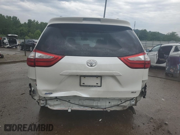 2015 Toyota Sienna XLE with VIN 5TDYK3DC6FS630405, listed as a Copart auction lot 59872045 with 60,306 mi miles and Salvage title. Bid and sale history available at DreamBid. Image 6.
