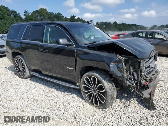 2015 GMC Yukon SLT with VIN 1GKS2BKC2FR666386, listed as a Copart auction lot 68471204 with 154,041 mi miles and Salvage Title. Bid and sale history available at carsss.com. Image 4.