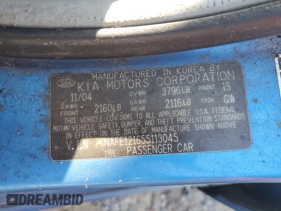 2005 Kia Spectra LX z VIN KNAFE121655113045, wystawiony jako Copart lot #61199595 z przebiegiem 156 310 mil mil oraz Szkoda całkowita • Salvage title. Historia ofert i sprzedaży dostępna na DreamBid. Obrazek 12.