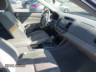2005 Toyota Camry LE with VIN 4T1BF32K25U603812, listed as a IAAI auction lot 41740671 with 242,316 mi miles and . Bid and sale history available at DreamBid. Image 5.