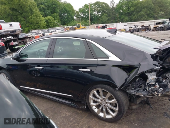 2017 Cadillac XTS Luxury z VIN 2G61M5S32H9106273, wystawiony jako IAAI lot #42134400 z przebiegiem Nie podano mil oraz . Historia ofert i sprzedaży dostępna na DreamBid. Obrazek 13.