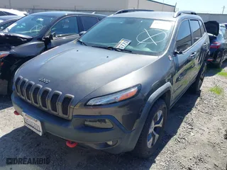 2018 Jeep Cherokee Trailhawk with VIN 1C4PJMBX0JD534722, listed as a IAAI auction lot 41557426 with 109,429 mi miles. Bid and sale history available at carsss.com. Image 17.