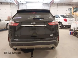 2020 Ford Edge SEL z VIN 2FMPK4J95LBA90533, wystawiony jako IAAI lot #42151916 z przebiegiem 57 197 mil mil oraz . Historia ofert i sprzedaży dostępna na DreamBid. Obrazek 16.