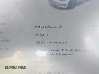 2023 Tesla Model 3 with VIN 5YJ3E1EA2PF582331, listed as a IAAI auction lot 41043858 with 33,601 mi miles and . Bid and sale history available at DreamBid. Image 7.