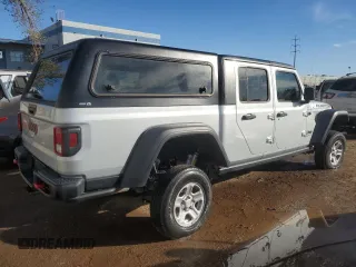 2023 Jeep Gladiator Rubicon FarOut z VIN 1C6JJTBM2PL587711, wystawiony jako Copart lot #77280214 z przebiegiem Nie podano mil oraz Szkoda całkowita • Salvage title. Historia ofert i sprzedaży dostępna na DreamBid. Obrazek 3.