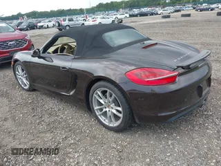 2014 Porsche Boxster with VIN WP0CA2A81ES121030, listed as a IAAI auction lot 42690064 with 47,257 mi miles and . Bid and sale history available at DreamBid. Image 3.