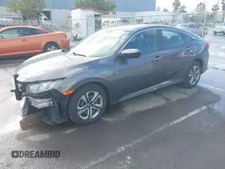 2017 Honda Civic LX z VIN 2HGFC2F50HH540361, wystawiony jako IAAI lot #41809159 z przebiegiem 96 590 mil mil oraz . Historia ofert i sprzedaży dostępna na DreamBid. Obrazek 18.